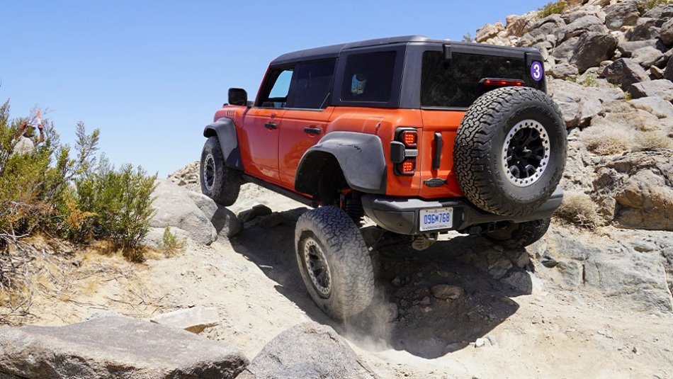 Orange B Raptor Rock Crawling.jpeg